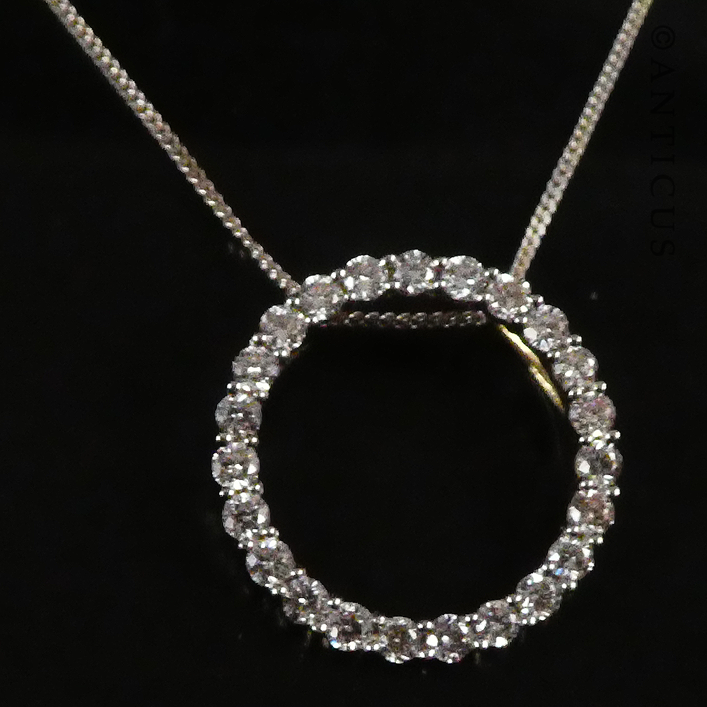 Gold and Diamond Circular Pendant on Chain.