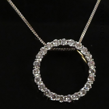Gold and Diamond Circular Pendant on Chain.