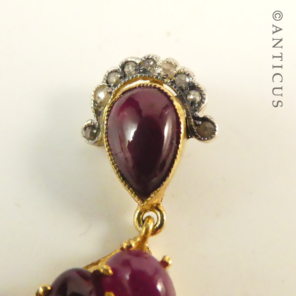 Antique-Style Pendant with Cabochon Rubies and Diamonds.