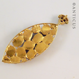 Antique-Style Pendant with Cabochon Rubies and Diamonds.