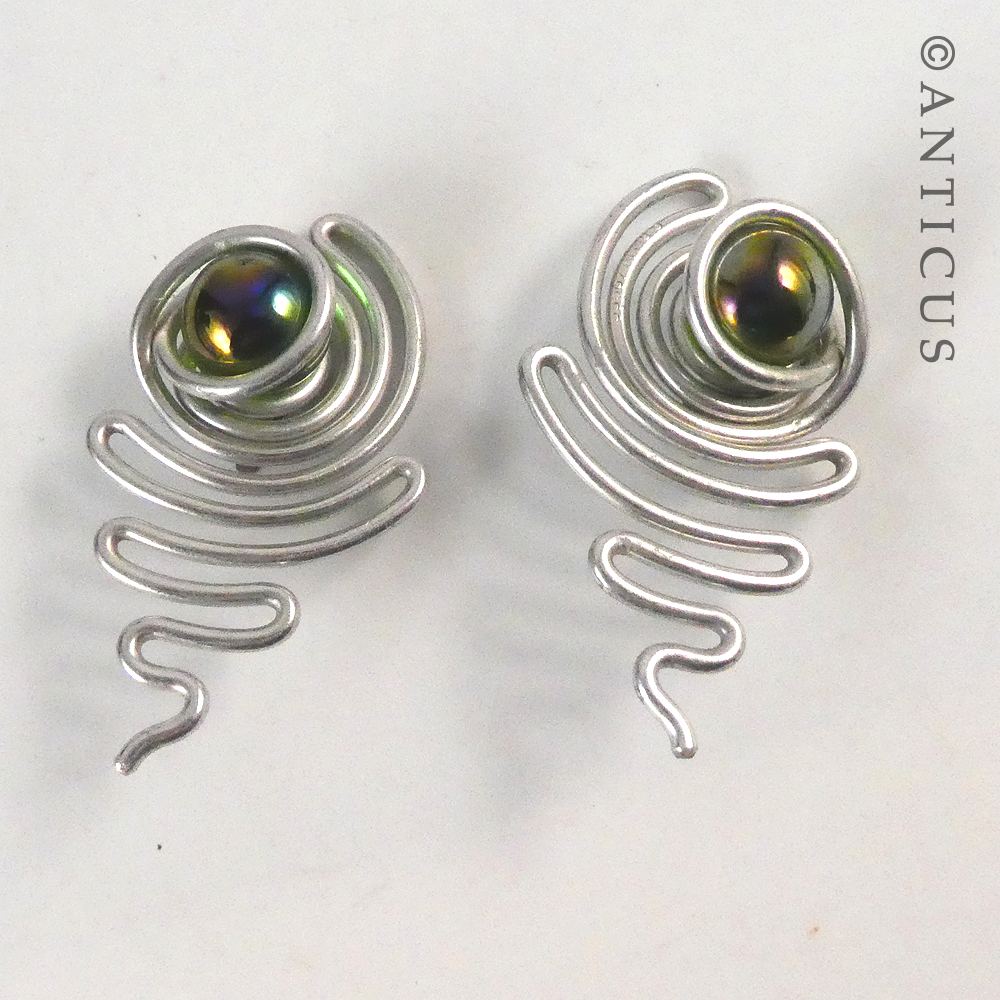 Craftsman-made Earrings and Brooch.