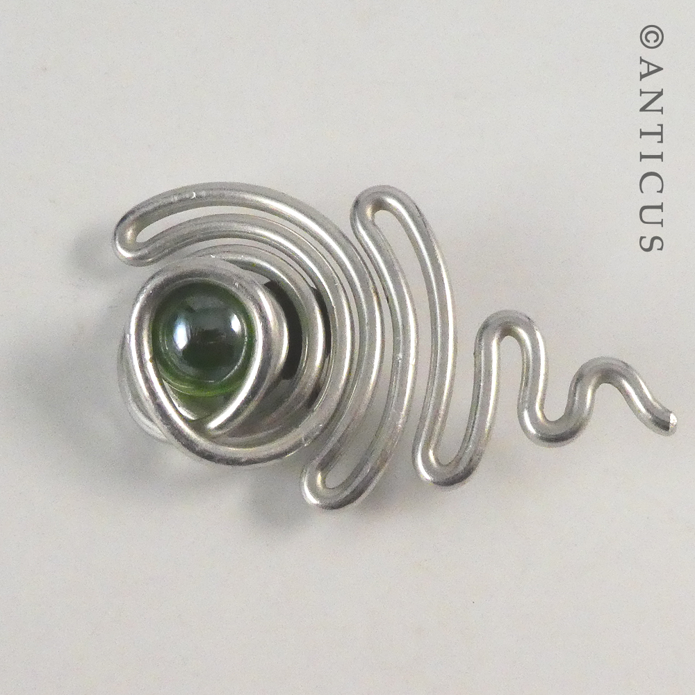 Craftsman-made Earrings and Brooch.