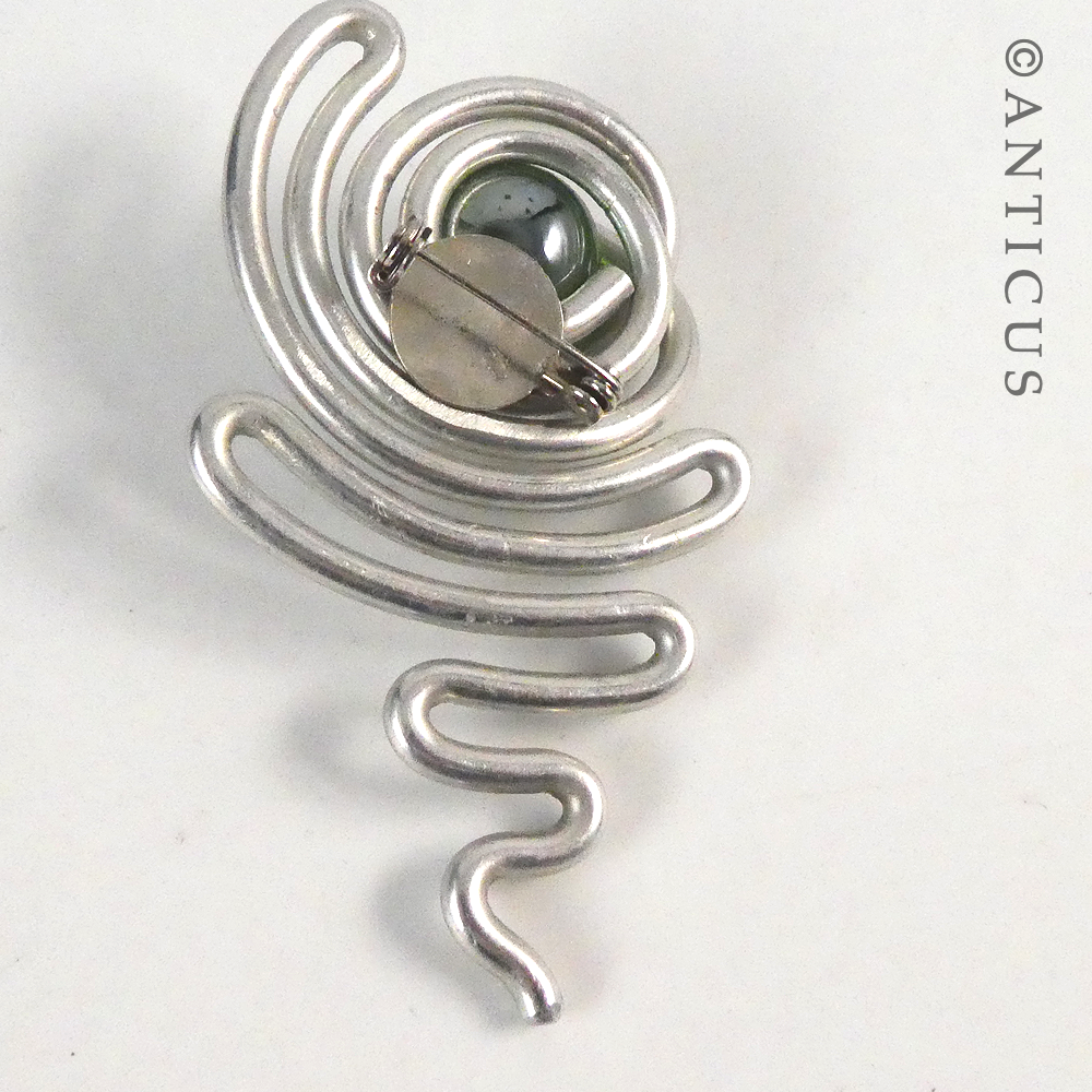 Craftsman-made Earrings and Brooch.