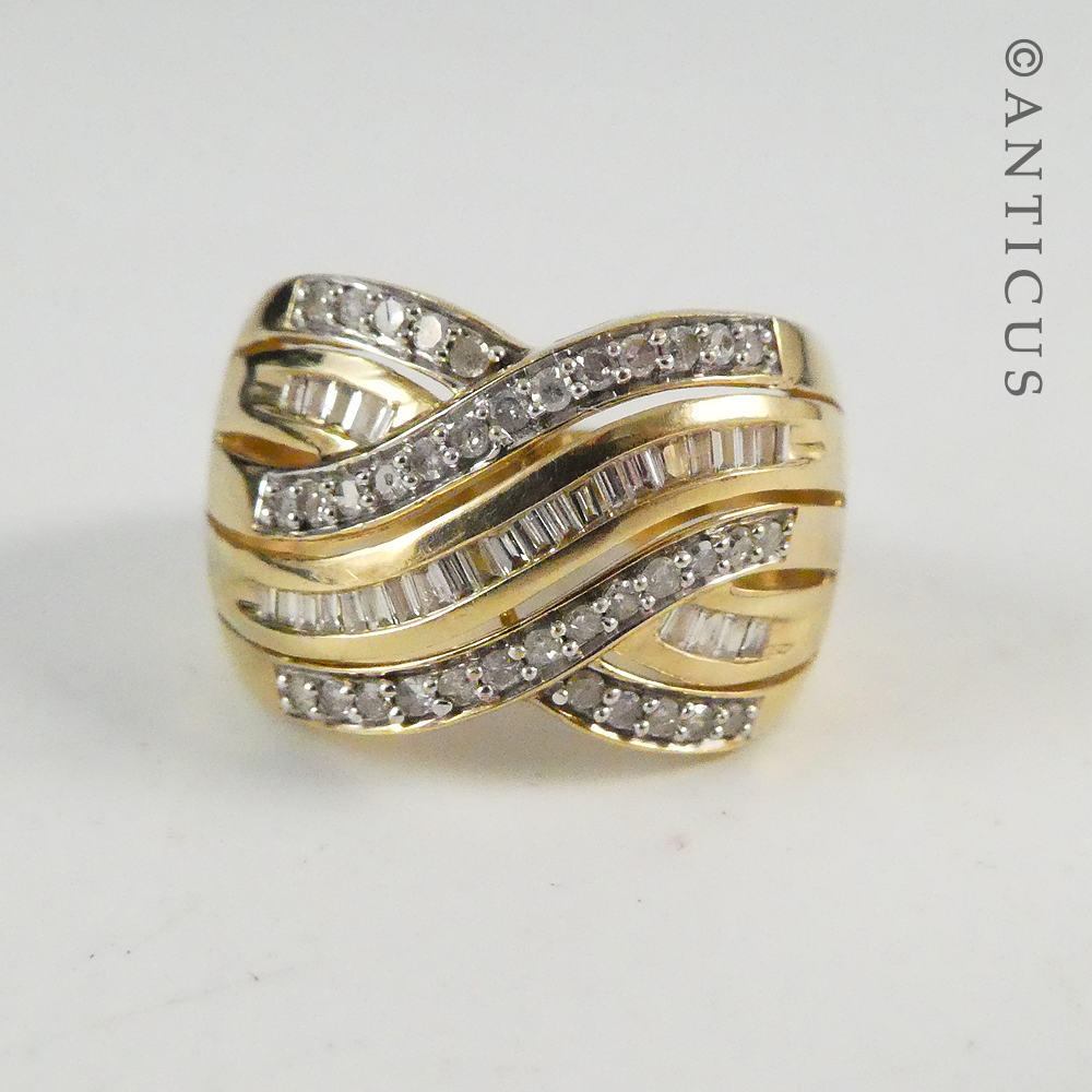 Gold and Diamond Wide Cross-Over Ring.