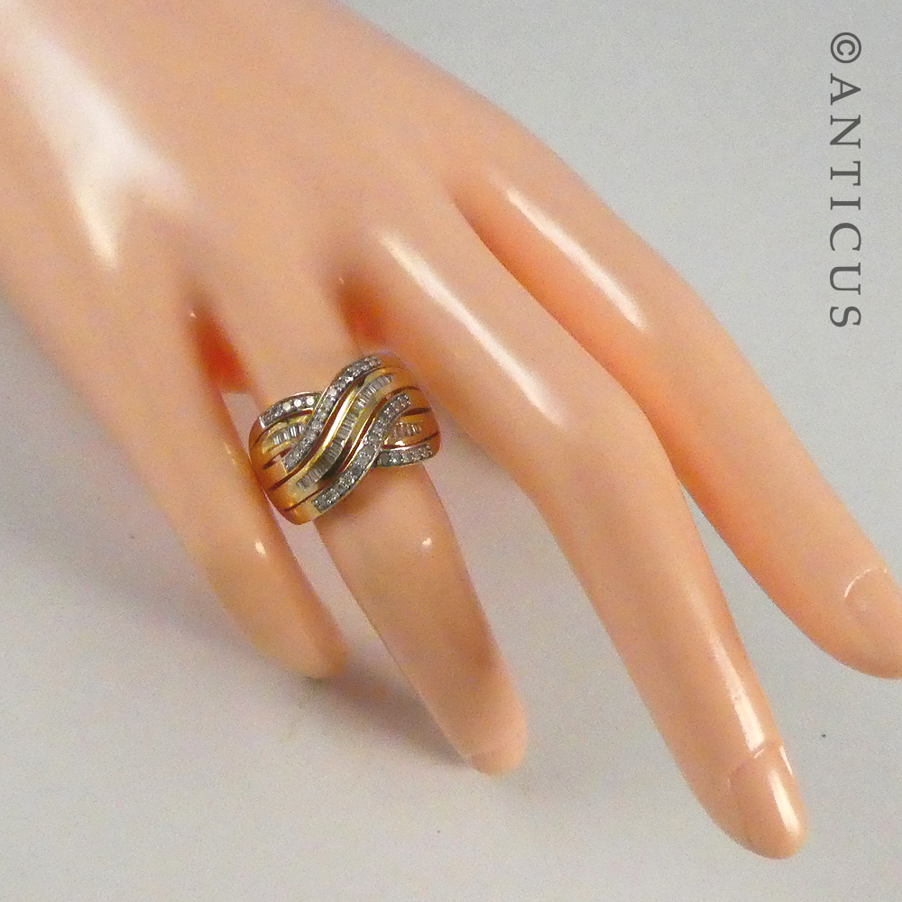 Gold and Diamond Wide Cross-Over Ring.