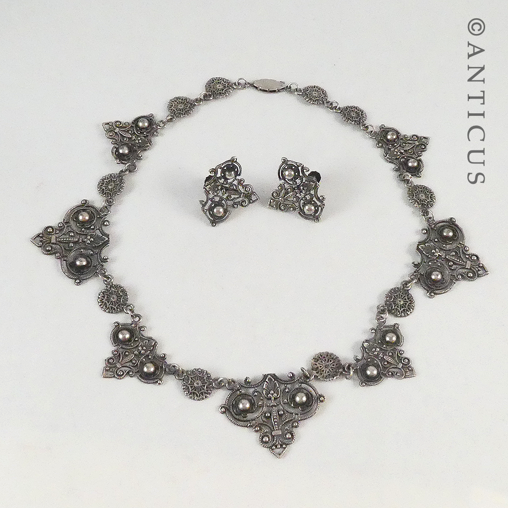 Ornate Necklace and Matching Earrings.