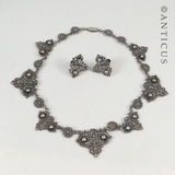 Ornate Necklace and Matching Earrings.