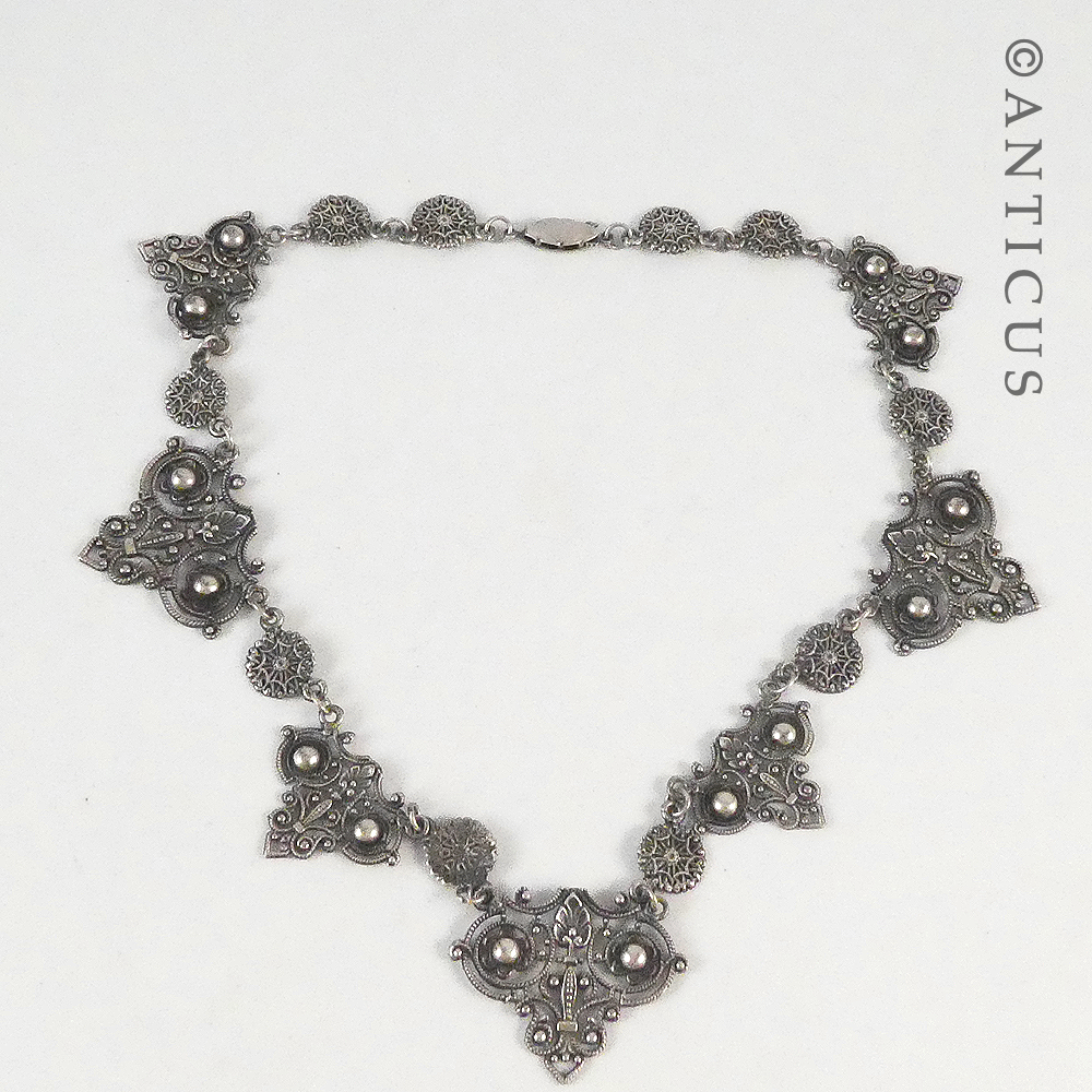 Ornate Necklace and Matching Earrings.