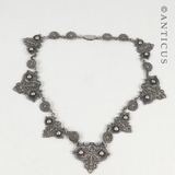Ornate Necklace and Matching Earrings.