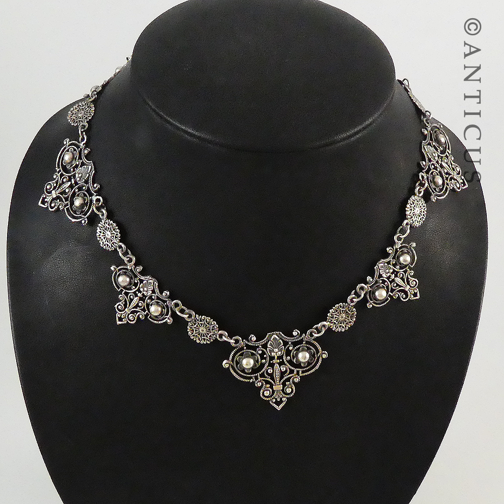 Ornate Necklace and Matching Earrings.