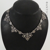Ornate Necklace and Matching Earrings.
