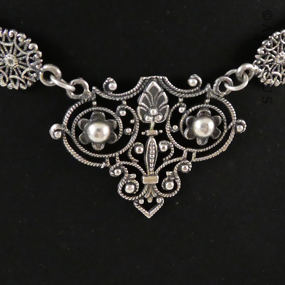 Ornate Necklace and Matching Earrings.