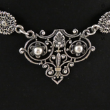 Ornate Necklace and Matching Earrings.