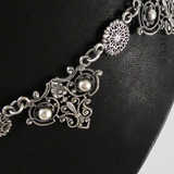Ornate Necklace and Matching Earrings.