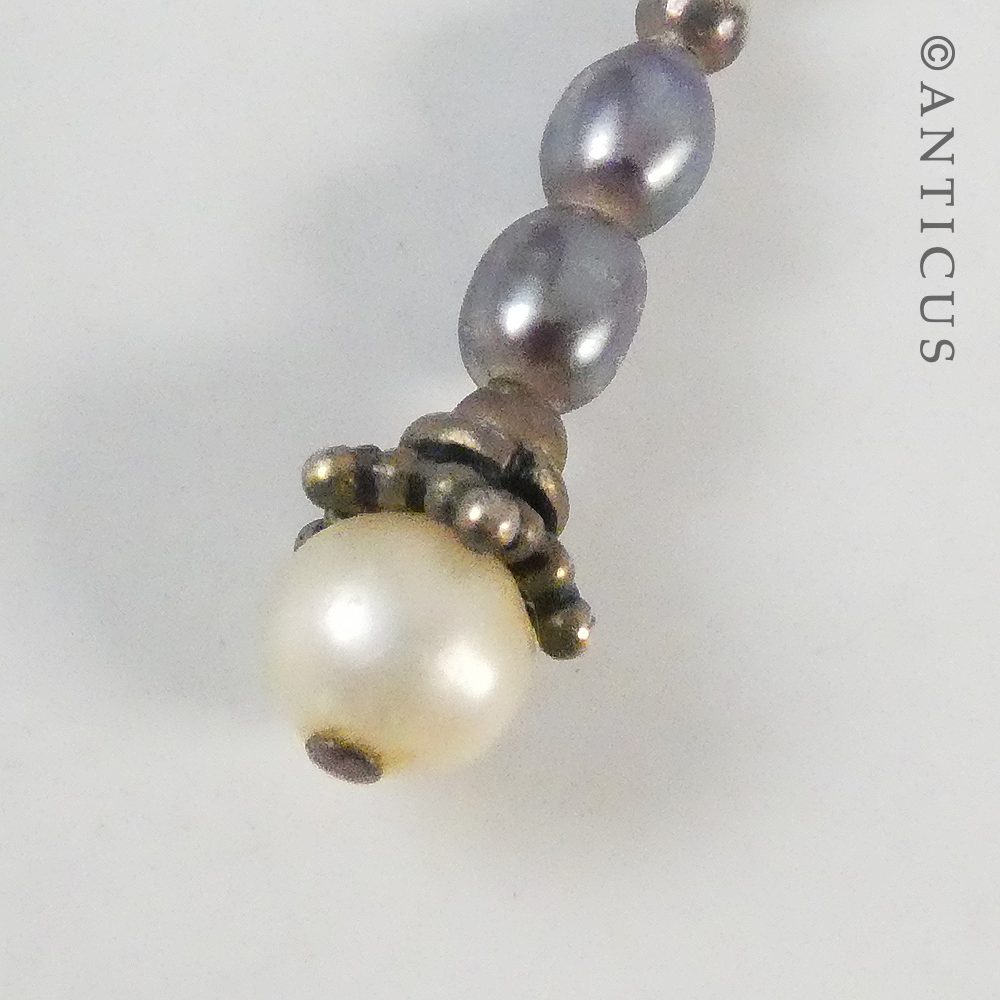 Pair of Black and White Pearl Earrings.