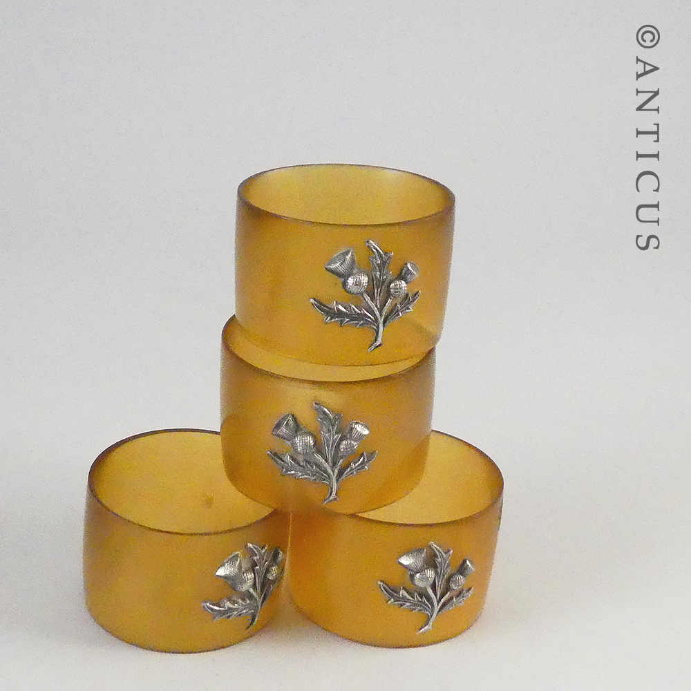 Set of 4 Horn and Silver Napkin Rings.