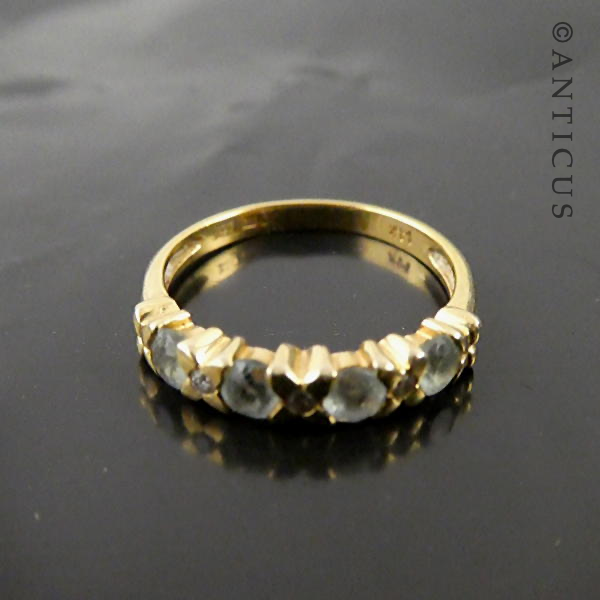 14ct Gold, Diamond and Blue Topaz Ring.