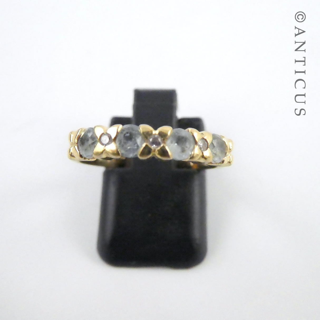 14ct Gold, Diamond and Blue Topaz Ring.