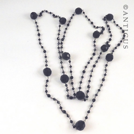 Very Long Black Bead Necklace.