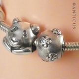 Silver Snake Chain Bracelet with 7 Charms.