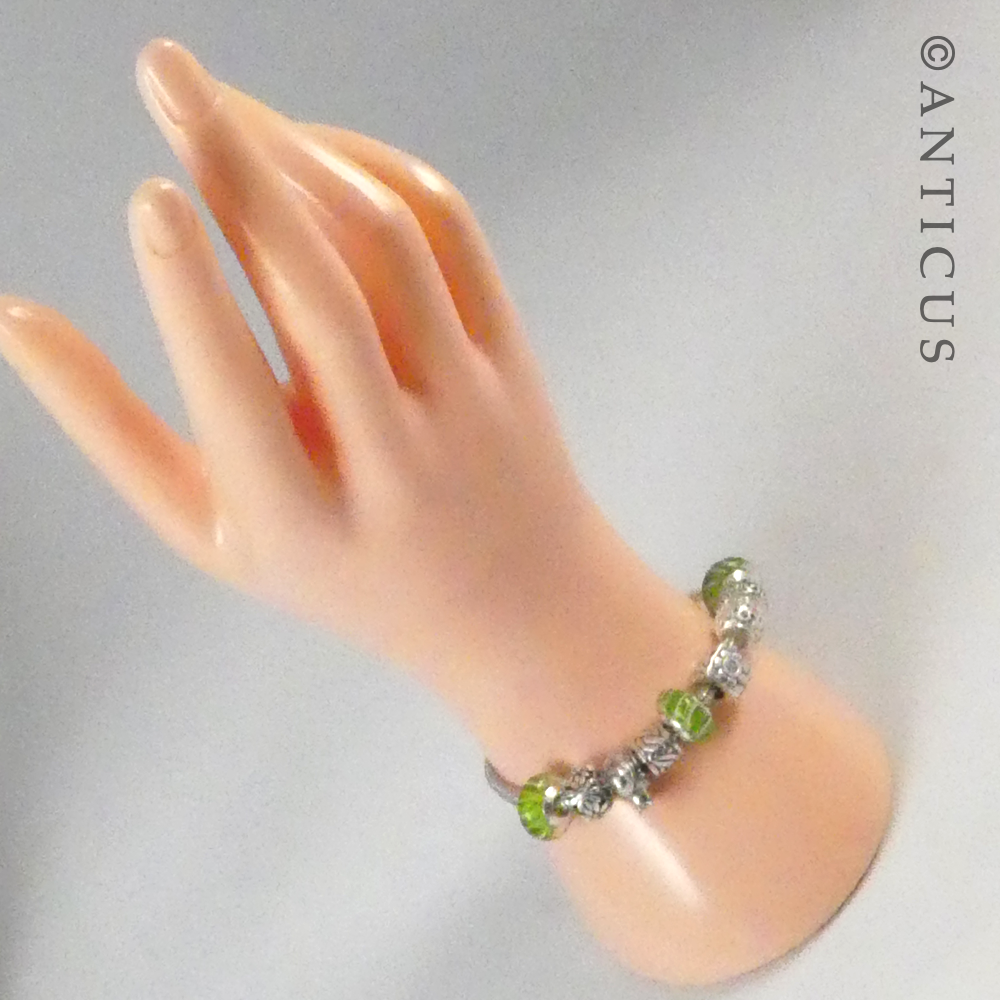 Silver Charm Bracelet with 12 Charms.