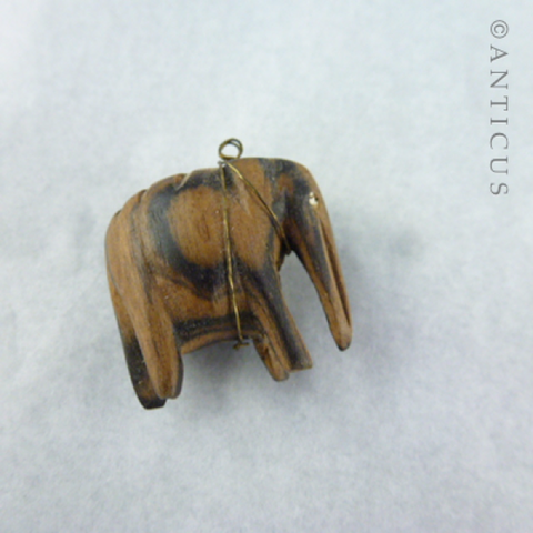Tiny Carved Wood Elephant.