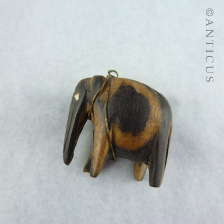 Tiny Carved Wood Elephant.