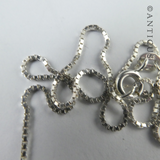 Three Pearl Pendants on Silver Chain.