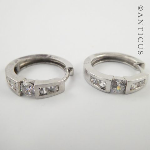 Pair of Silver Huggie Earrings with CZ's.