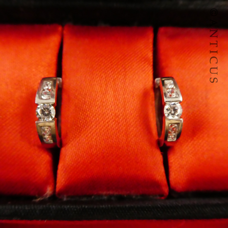 Pair of Silver Huggie Earrings with CZ's.