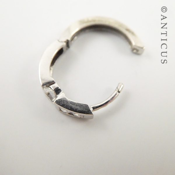 Pair of Silver Huggie Earrings with CZ's.