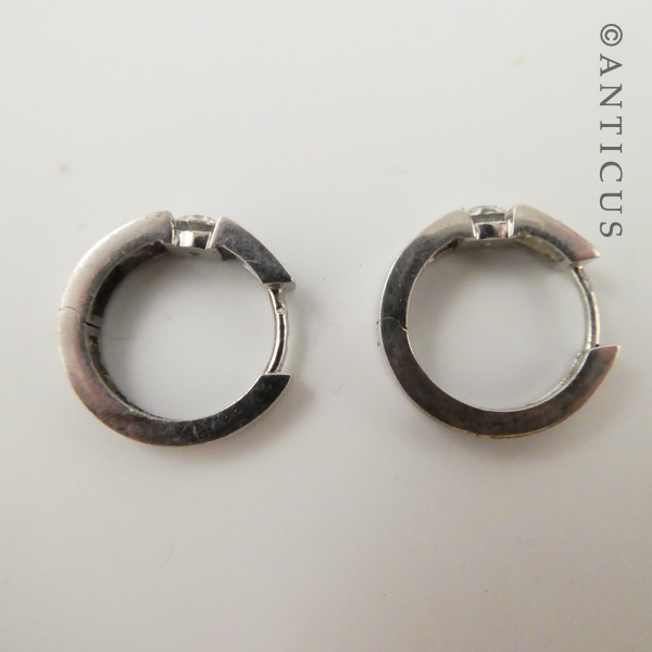 Pair of Silver Huggie Earrings with CZ's.