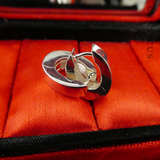 Oval Sterling Silver Huggie Earrings.
