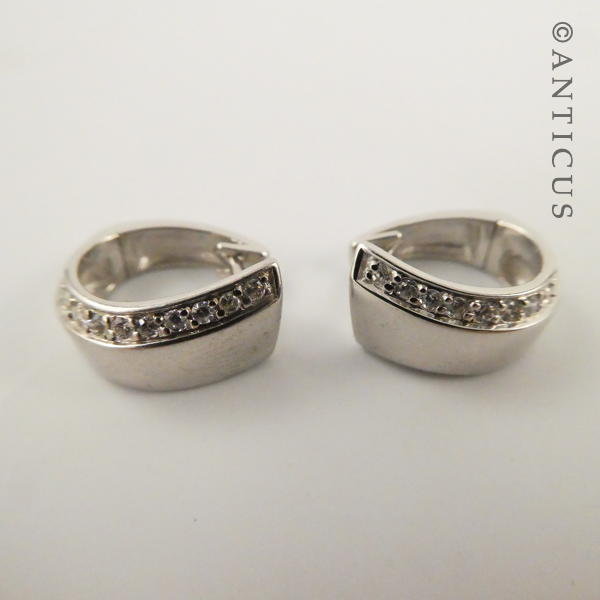 Pair of Silver Huggie Earrings with CZ's.
