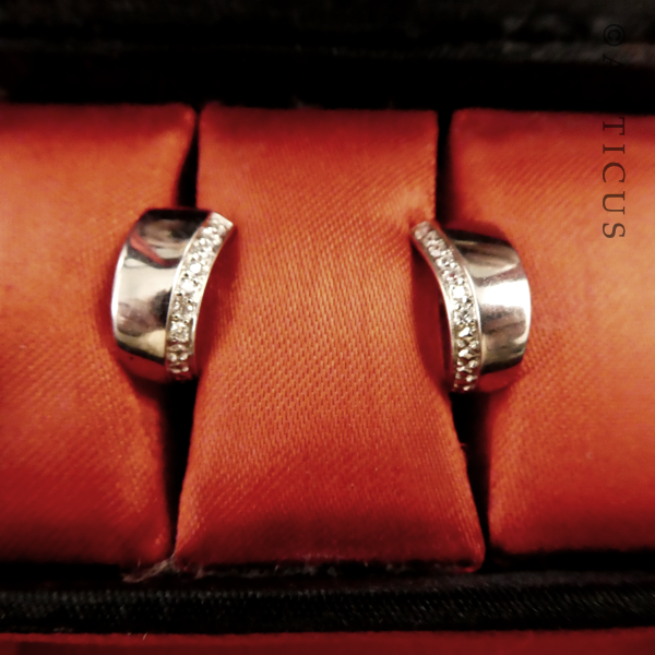 Pair of Silver Huggie Earrings with CZ's.