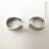 Pair of Silver Huggie Earrings with CZ's.