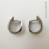 Pair of Silver Huggie Earrings with CZ's.