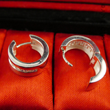 Pair of Silver Hoop Earrings, CZ Stones.