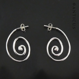 Silver Curled Circle Hoop Earrings.