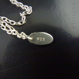 Pink Paisley Charm with Pearls on Long Chain.
