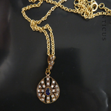 Pendant and Chain, Bronze and CZs