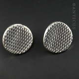 Concave Silver Disc Earrings with Hatched Design.