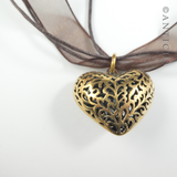 Polished Bronze Heart Pendant on Organza Ribbon.