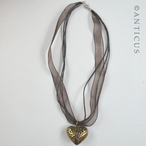 Polished Bronze Heart Pendant on Organza Ribbon.