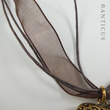 Polished Bronze Heart Pendant on Organza Ribbon.
