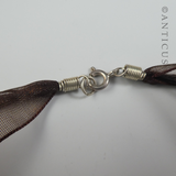 Polished Bronze Heart Pendant on Organza Ribbon.