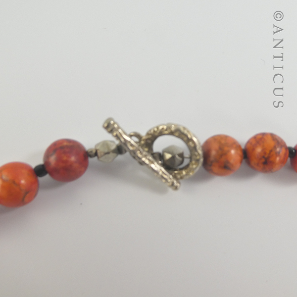 Coral Coloured Necklace with Silver Starfish Pendant.