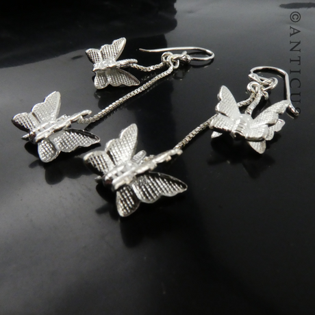 Silver Double Butterfly Drop Earrings.