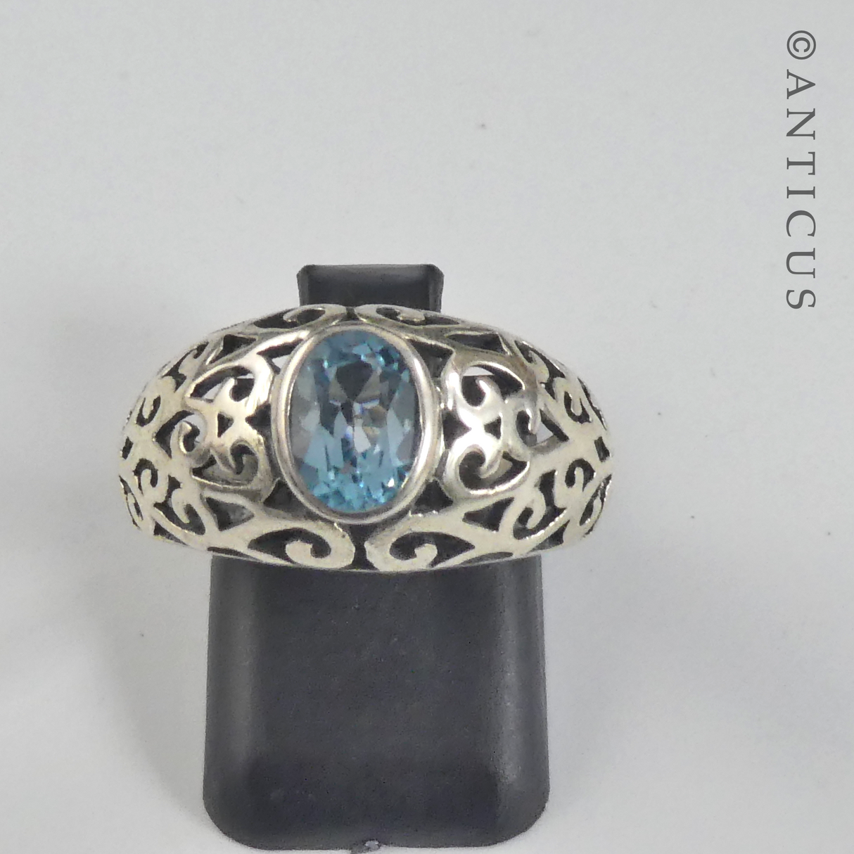Blue Topaz and Pierced-Work Silver Ring.
