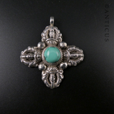 Silver and Turquoise Tribal-Style Pendant.